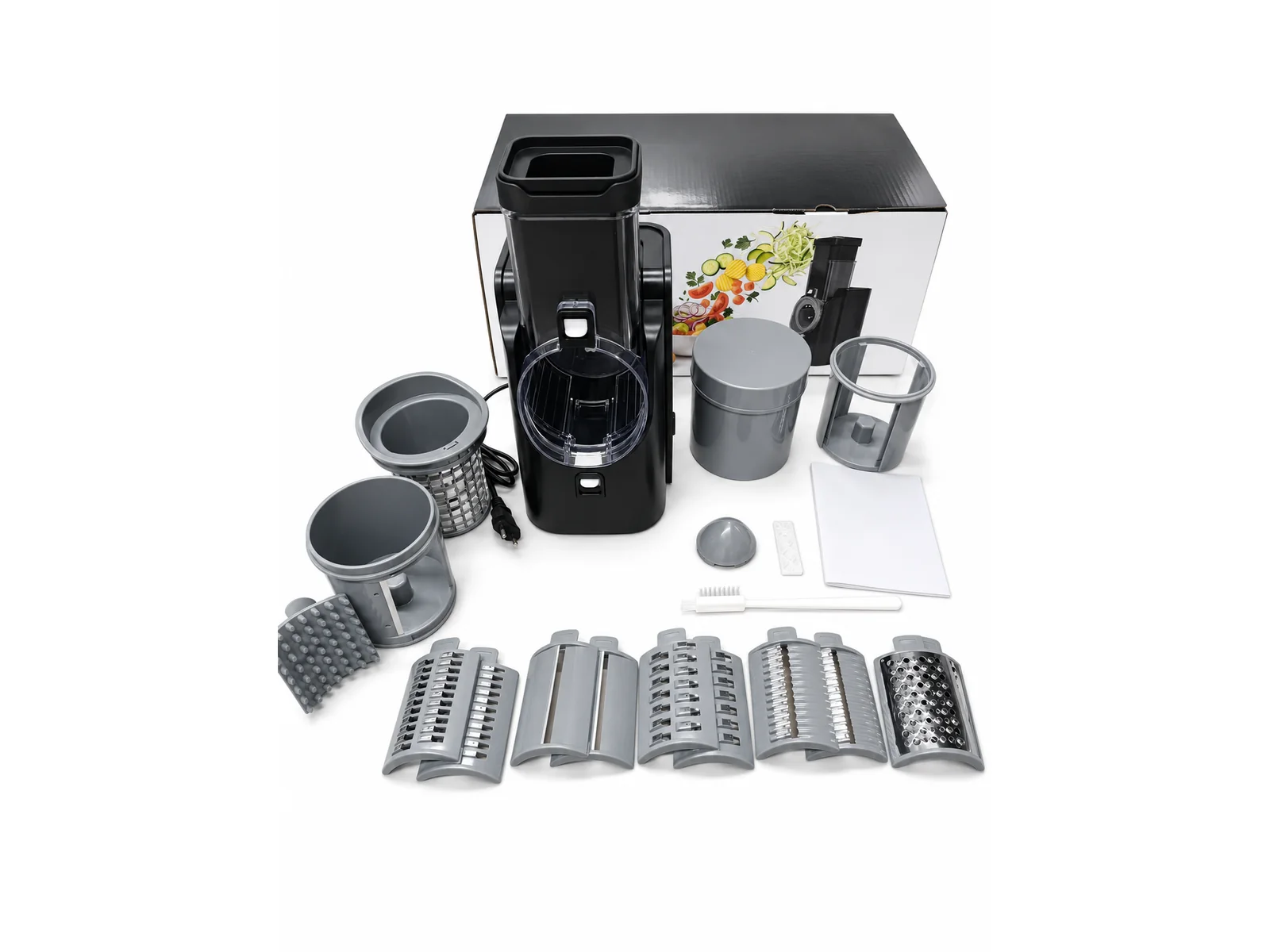 Electric salad maker with feed chute pusher cutting chamber and drum set