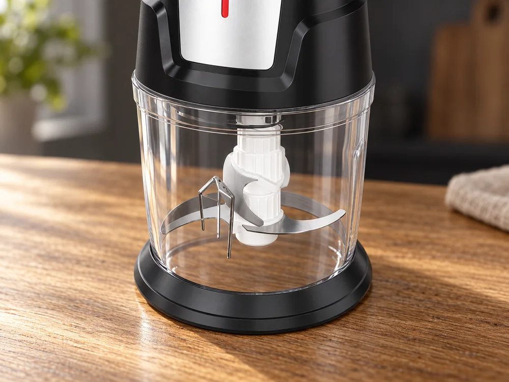 Close view of the TY-05 clear bowl and visible cutting assembly on a wood counter