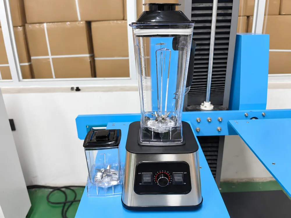 Countertop blender and small jar on a blue inspection bench